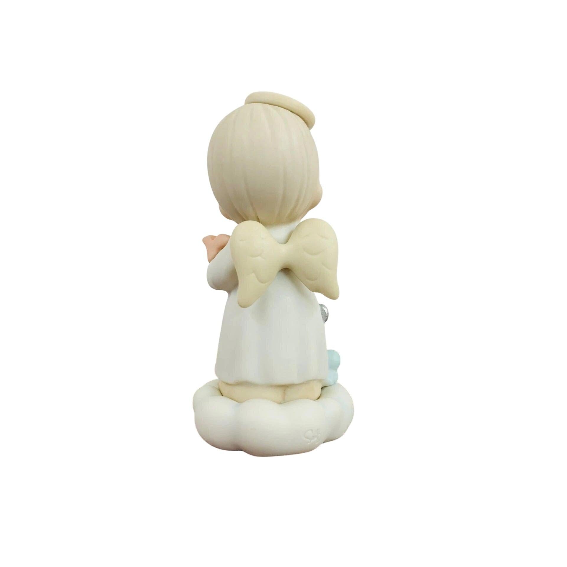 Adorable Child Figurine with Halo Holding Paper Plane - Sparking Joy and Imagination Image4