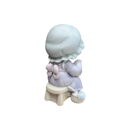 Adorable girl sews patch onto beloved teddy bear Image6