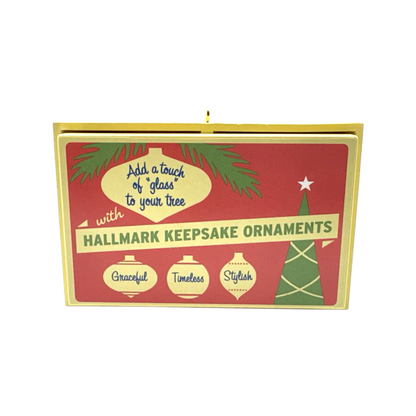 Hallmark Keepsake Ornaments packaging with red and gold design on a white background