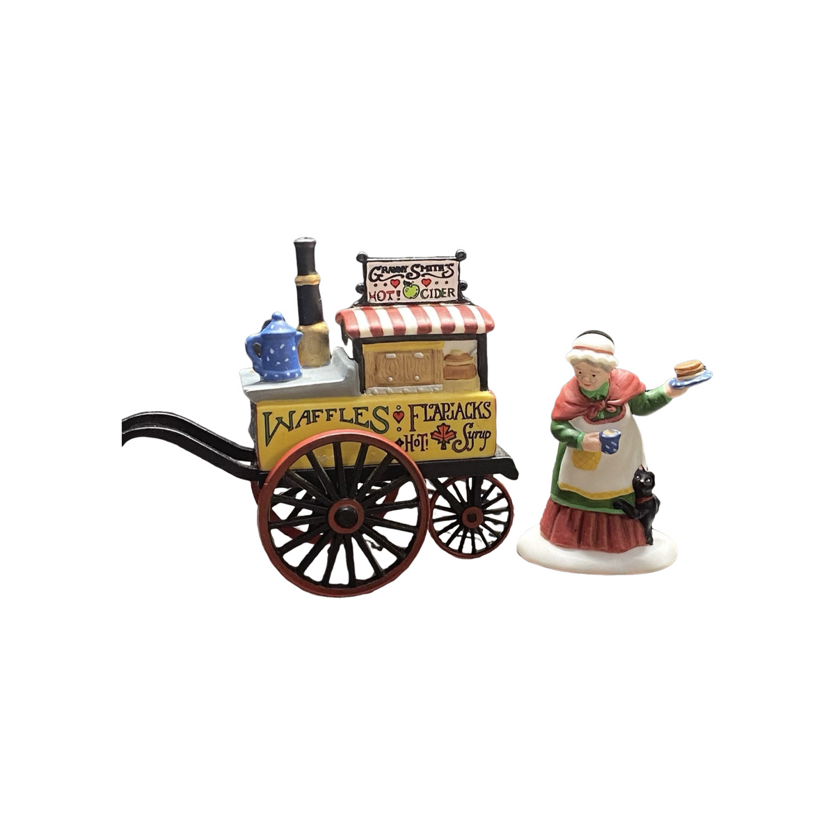 Charming Holiday Ornament Adds Nostalgia and Warmth to Festive Scene Image1