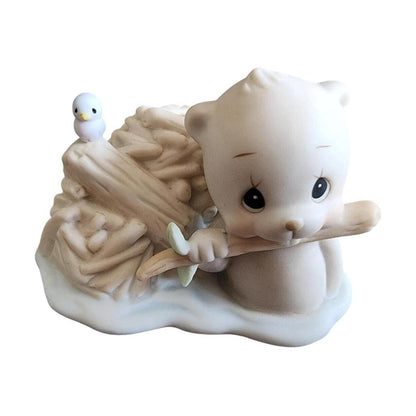 Charming squirrel on wooden branch nibbling on acorn-shaped house symbolizing home Image1