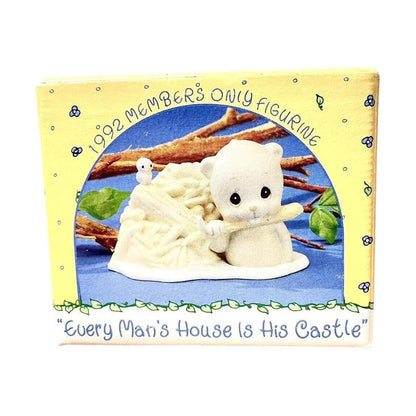 Charming squirrel on wooden branch nibbling on acorn-shaped house symbolizing home Image2