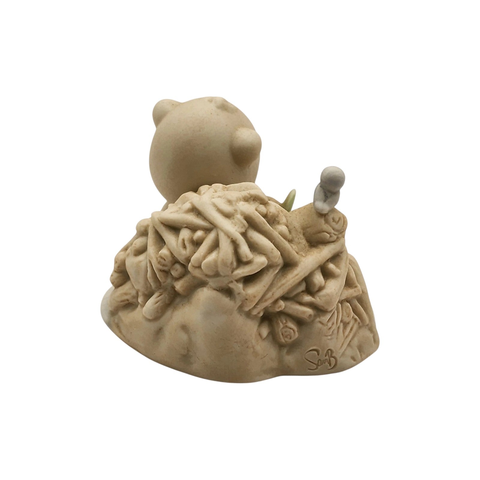 Charming squirrel on wooden branch nibbling on acorn-shaped house symbolizing home Image3