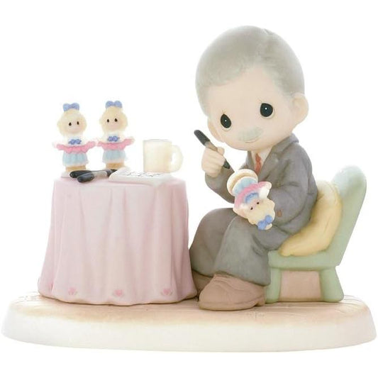 Commemorate Mr. Eugene Freedman with this Precious Moments charitable figurine Image1
