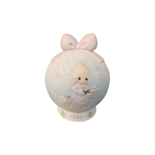 Festive Christmas Ornament: Young Girl with Red Ball & Ribbon Image1