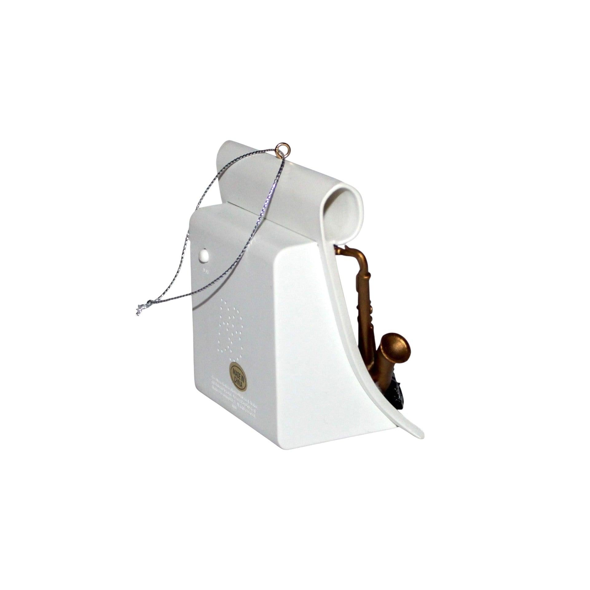 White birdhouse with a brown bird inside on a white background