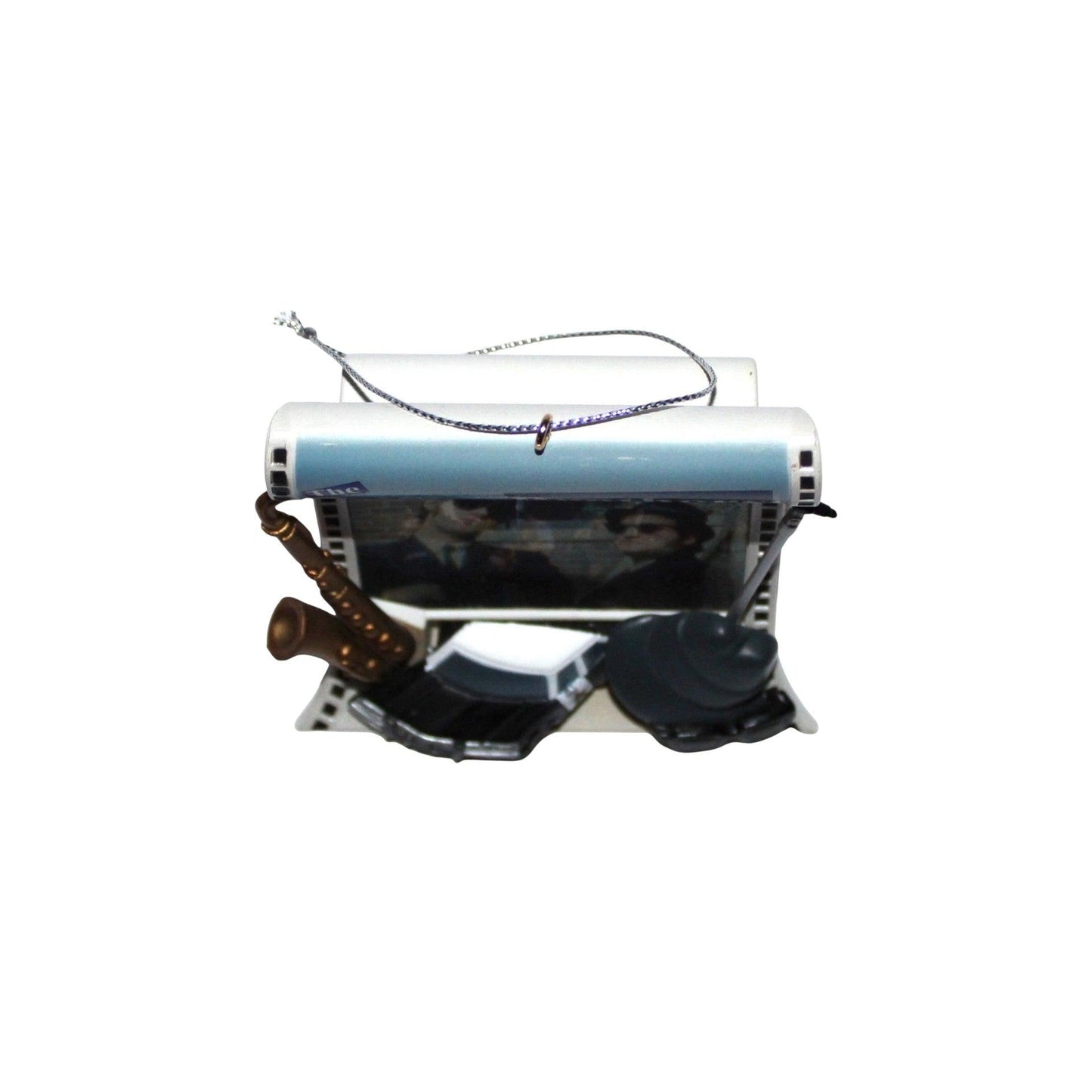 Small model of a steamroller with a pipe and goggles on a white background