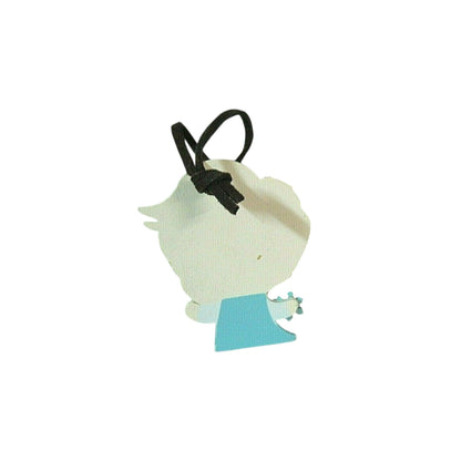 Small plush toy with a black hair tie on a white background