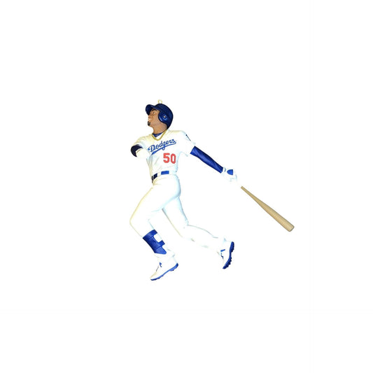Baseball player figurine in a Dodgers uniform with a bat on a white background