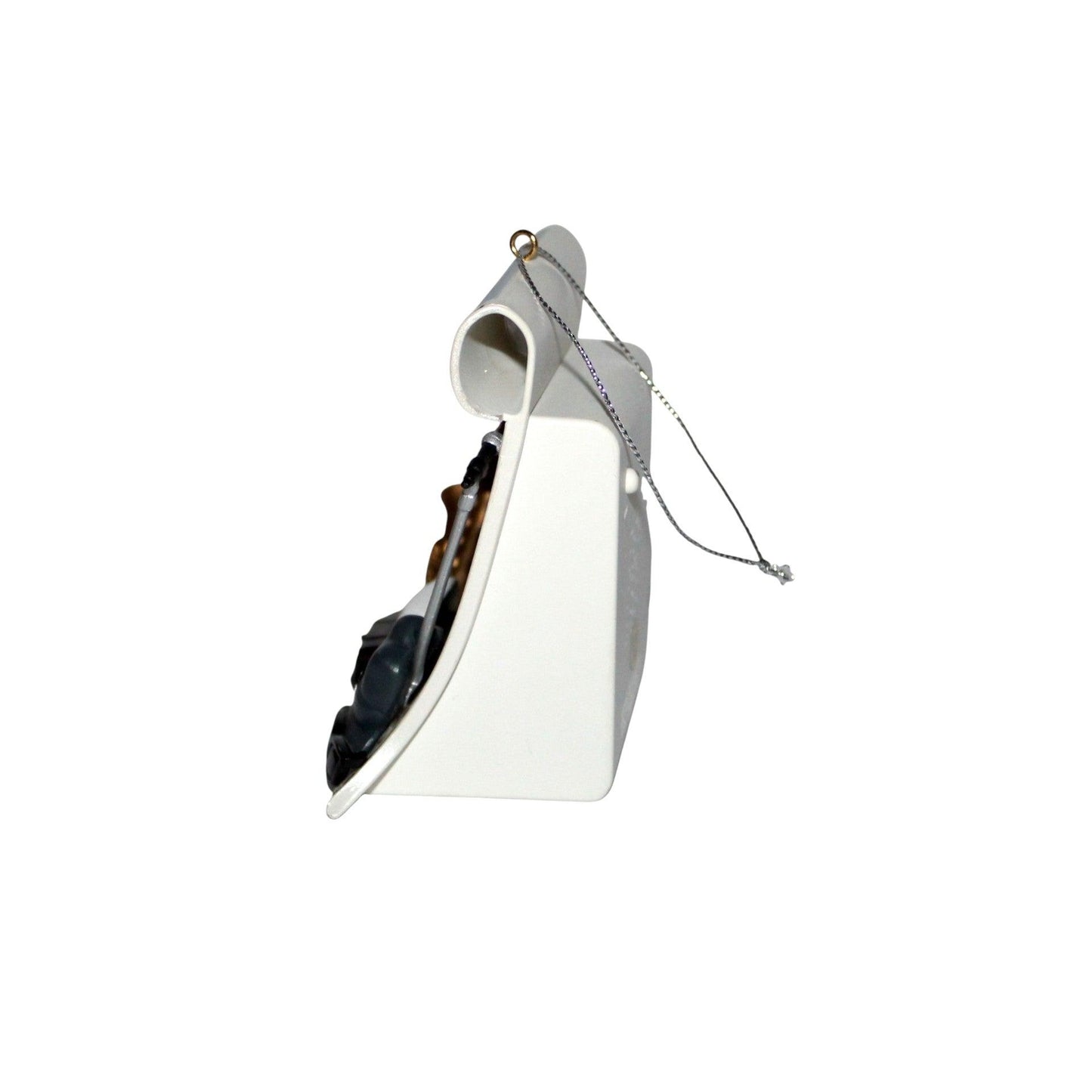 White birdhouse with a chain on a white background