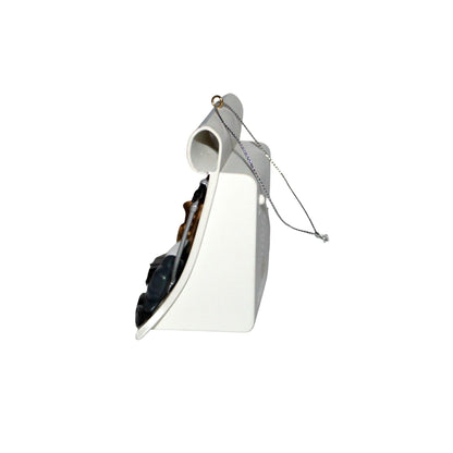 White birdhouse with a chain on a white background