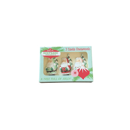 Box of 3 Santa Claus ornaments with a decorative design on a white background