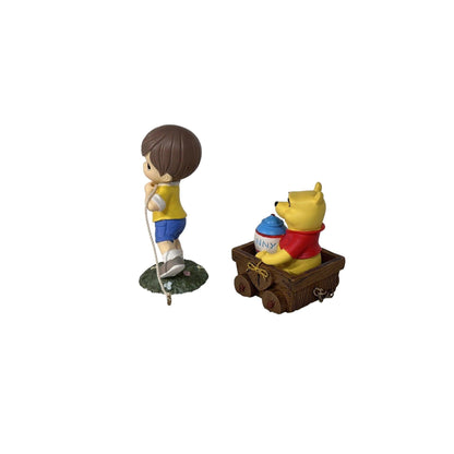 2012 Christopher Robin Pulling Pooh Figurine