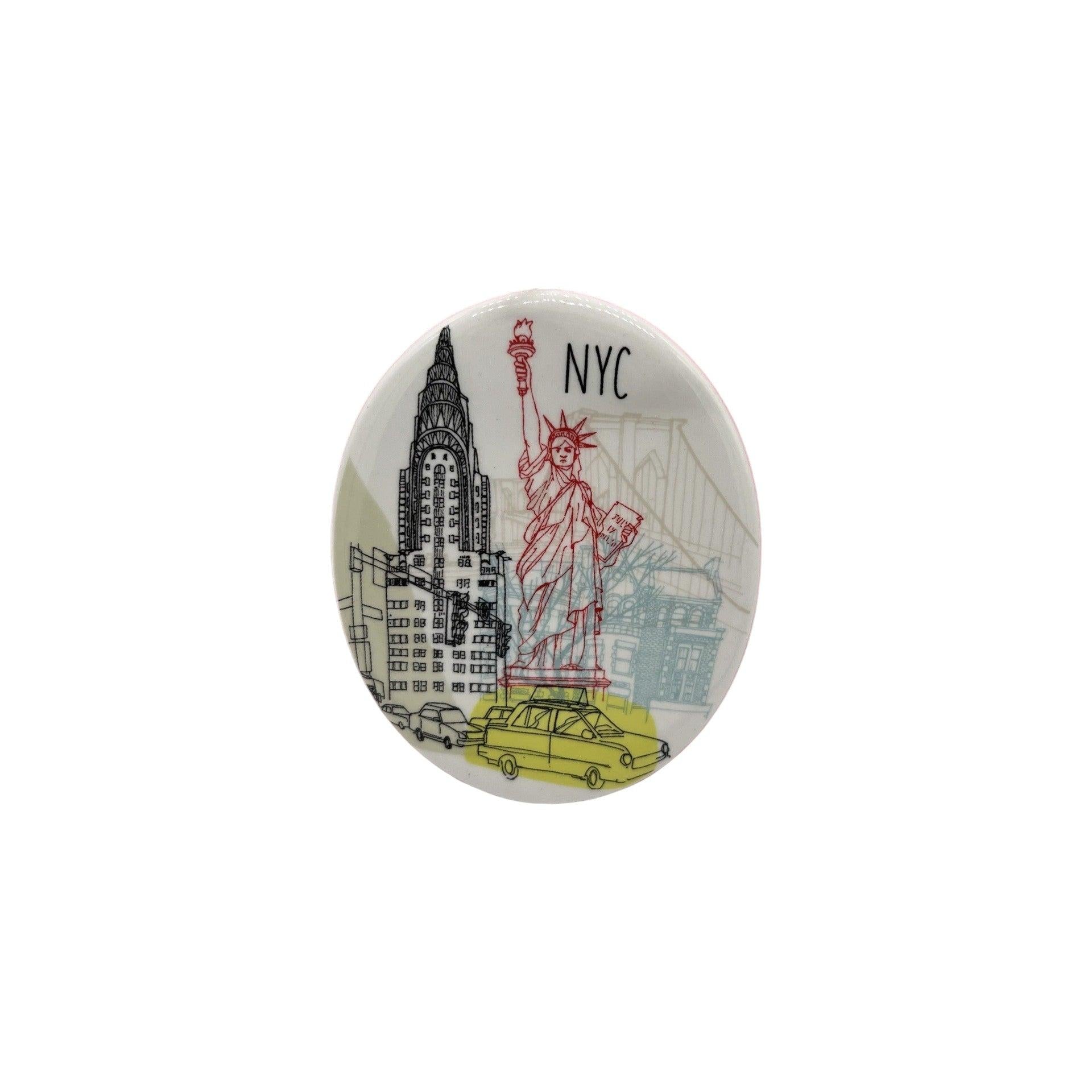 Button badge with illustrations of the Statue of Liberty, Chrysler Building, and yellow taxi on a white background.