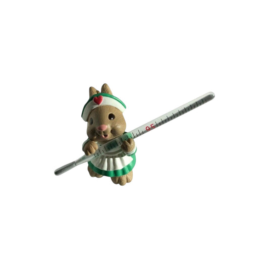 1995 Christmas Fever Hallmark Ornament (Nurse) QX5967 Image1