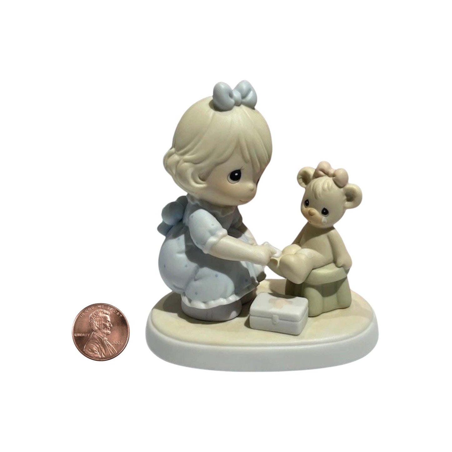 1994 Caring (Precious Moments — Members’ Only Figurine)