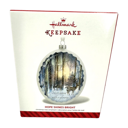 Hallmark Keepsake Christmas ornament packaging with a snowy landscape design.