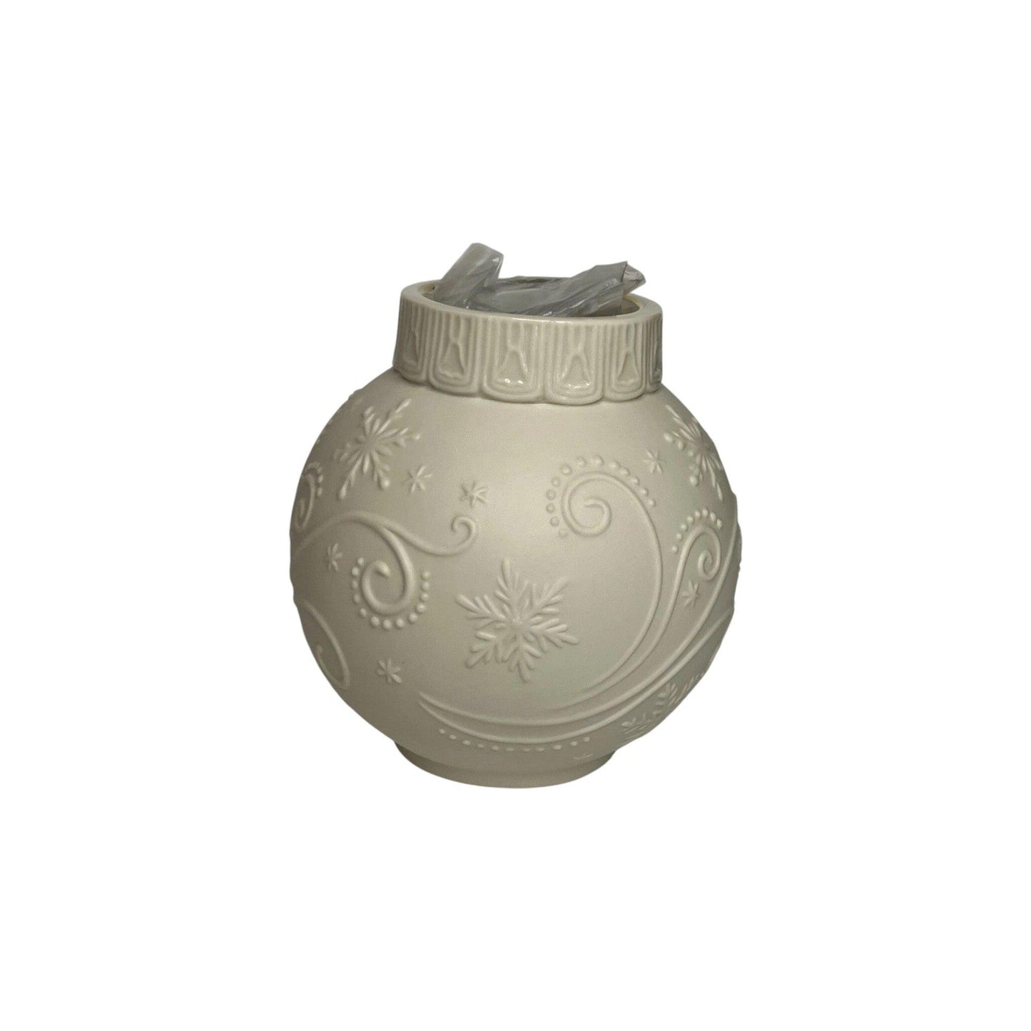 Decorative spherical lantern with snowflake patterns on a white background