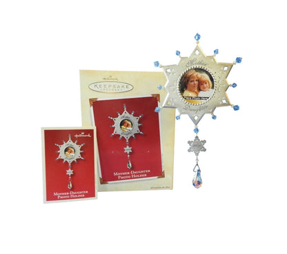 Star-shaped photo holder with 'Mother Daughter' text, featuring a photo of two children, on a white background.